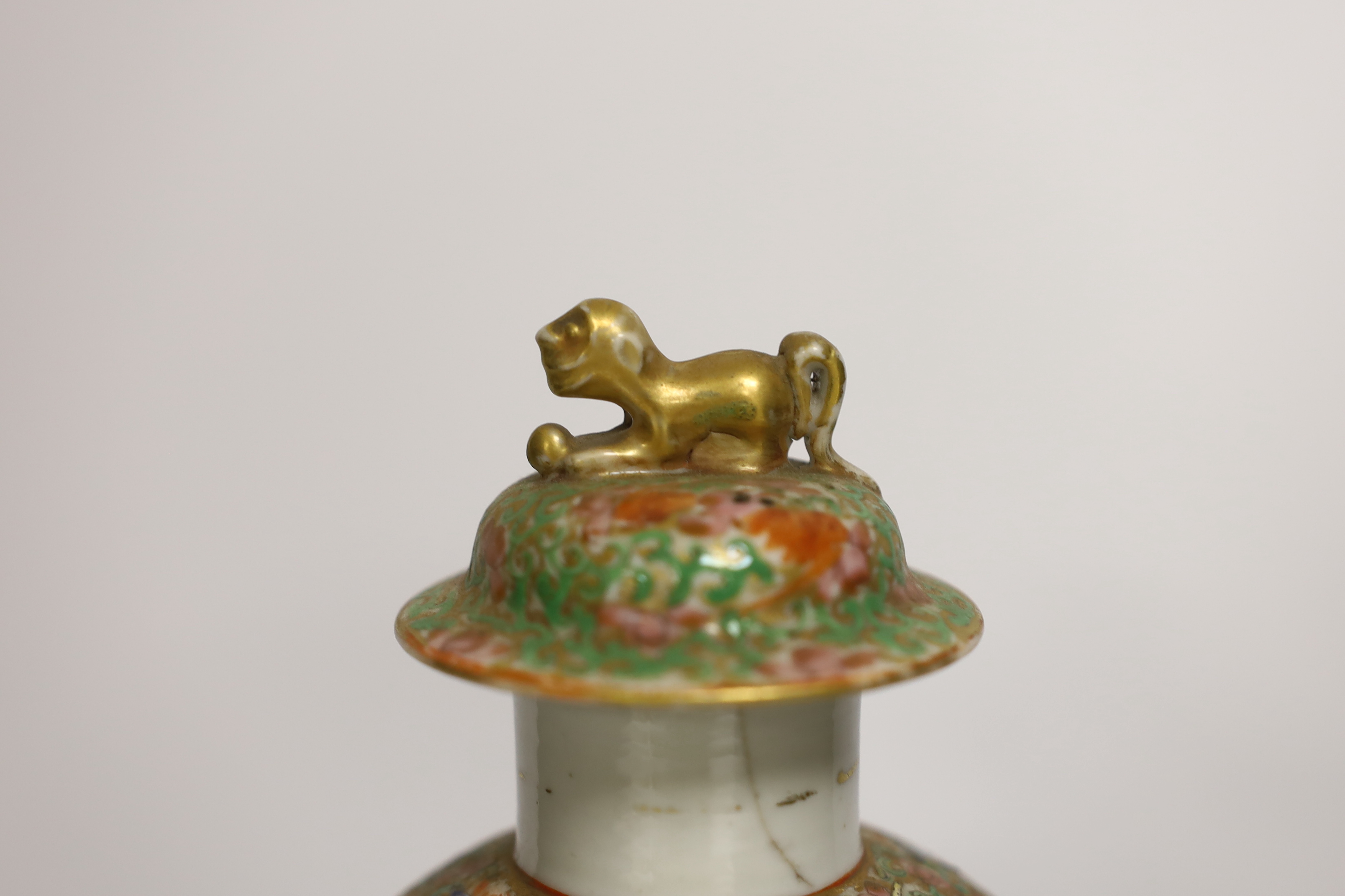 Chinese porcelain- a tall 19th century famille rose vase and cover, a famille rose jar, early 19th century probably made the Indian market, a famille noire jar and a Japanese vase, tallest 28cm high